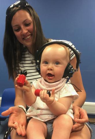 'Play' audiometry child with headphones